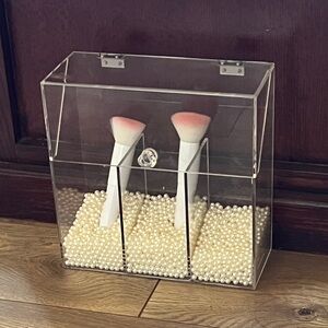 Acrylic make up brush holder with beads and new brushes.